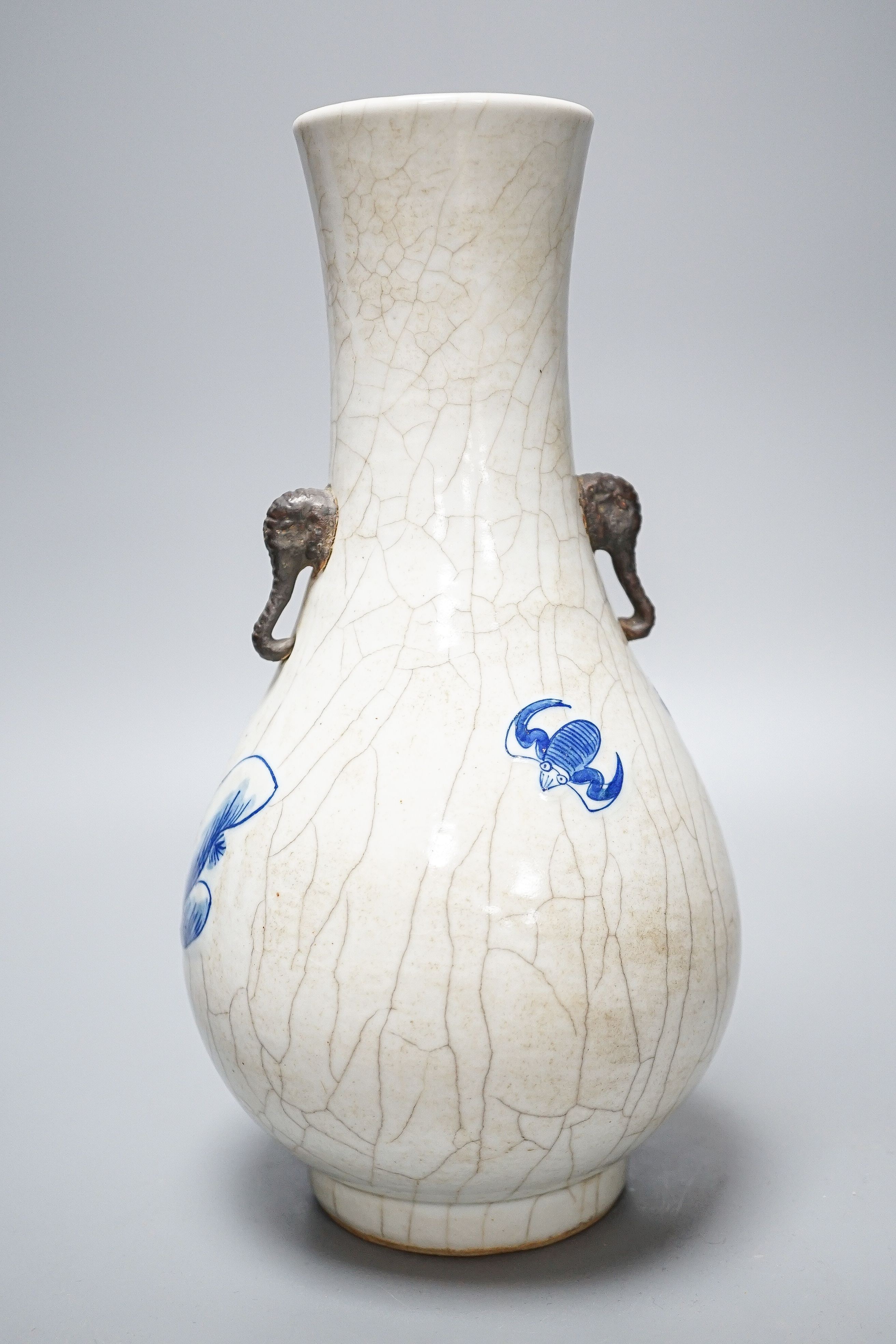 A Chinese crackle glaze porcelain two handled vase, painted in underglaze blue, seal mark, 27cm